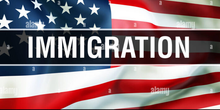 immigration-on-a-usa-flag-background-3d-rendering-united-states-of-america-flag-waving-in-the-wind-proud-american-flag-waving-american-immigration-R9X2NH