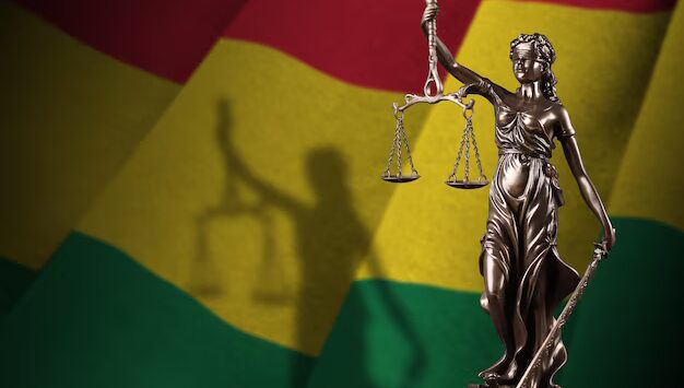 bolivia-flag-with-statue-lady-justice-judicial-scales-dark-room-concept-judgement-punishment_76080-18129.jpg